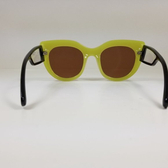 Rounded cat eye sunglasses with clear window detail on the arms - Picture 3 of 5